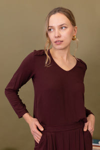 BLUSA ESCOTE PICO VOLANTE